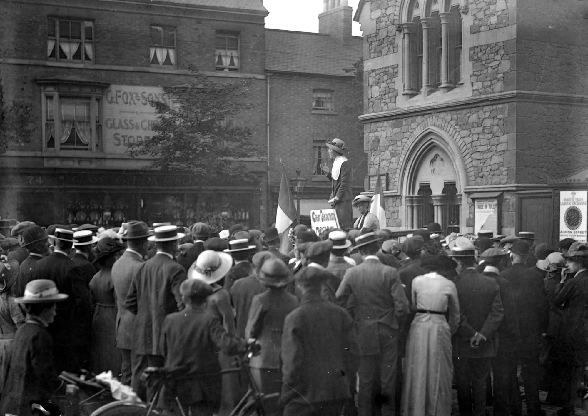 Suffragette meeting on Humberstone Gate next to the Weighbridge -