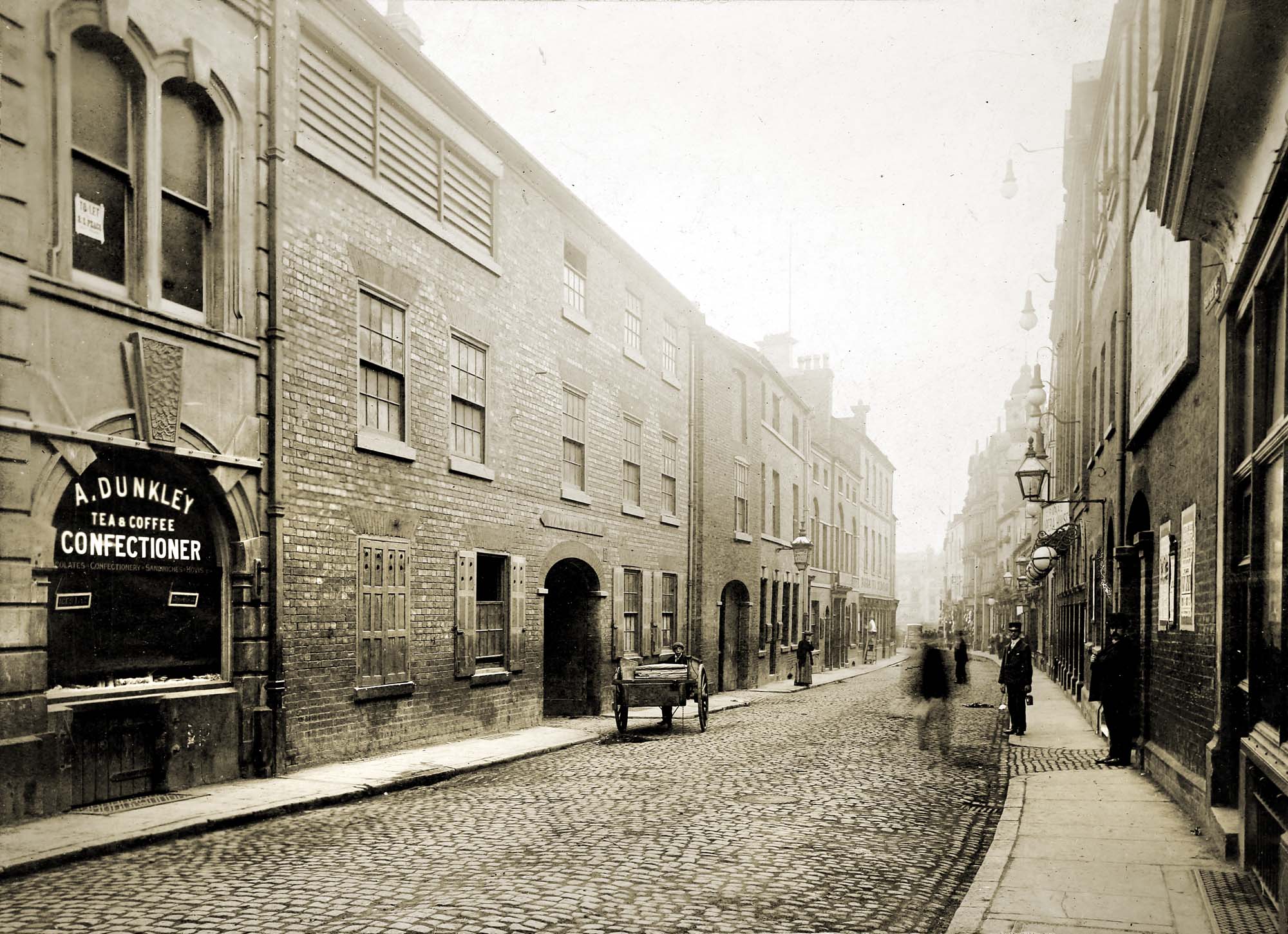 A view along Silver Street looking towards the Clock Tower, circa 1900 - Leicestershire Record Office