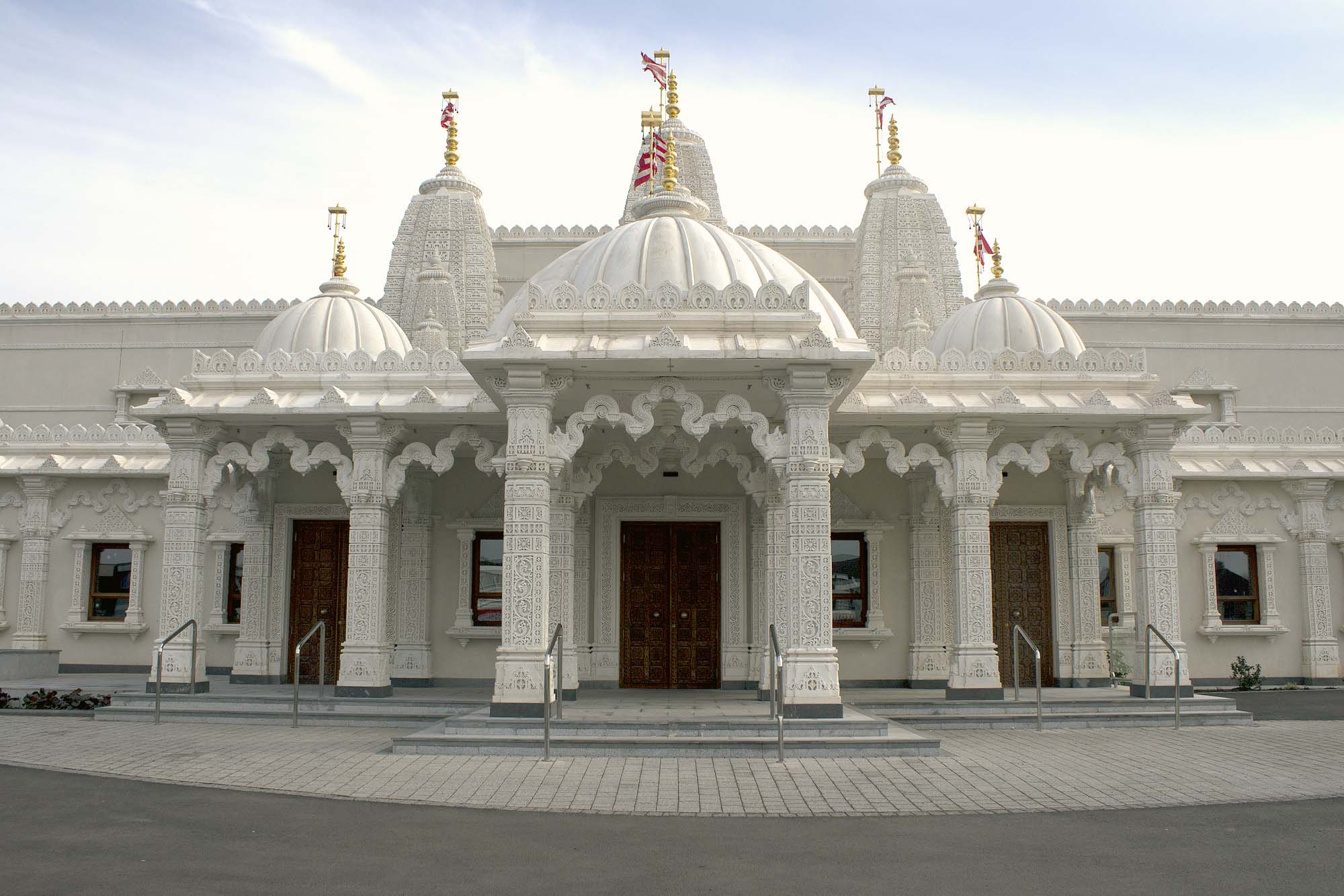 The front entrance has white limestone that was exquisitely carved in India -