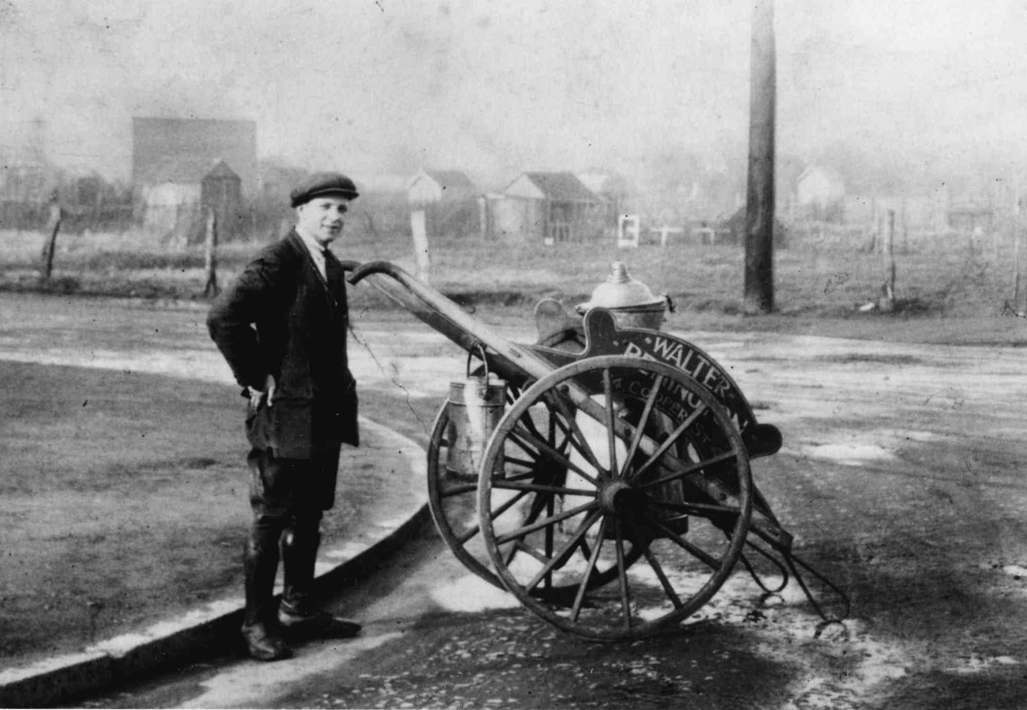 Worker with a dairy hand cart, c1926 - Record Office for Leicestershire, Leicester and Rutland