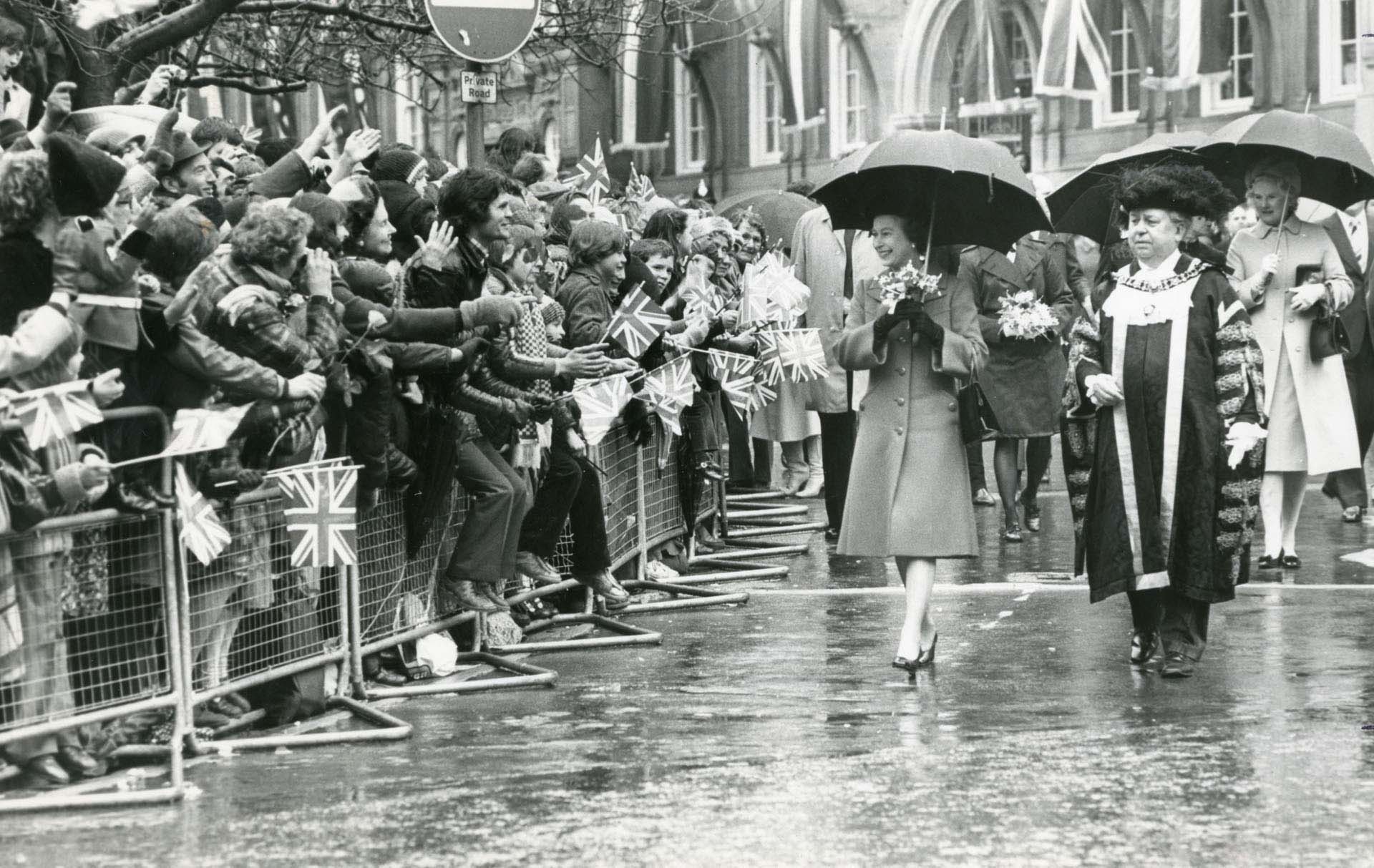 Queen Elizabeth II greets crowds in the Town Hall Square, 1980 - 