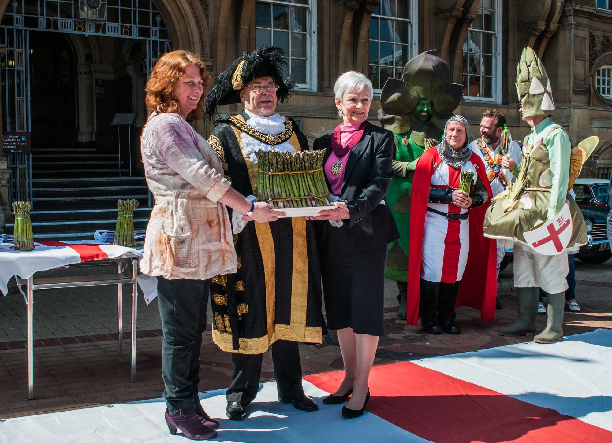 Lord Mayor John Thomas receives a bundle of asparagus at The Asparagus Festival, April 2015 - 