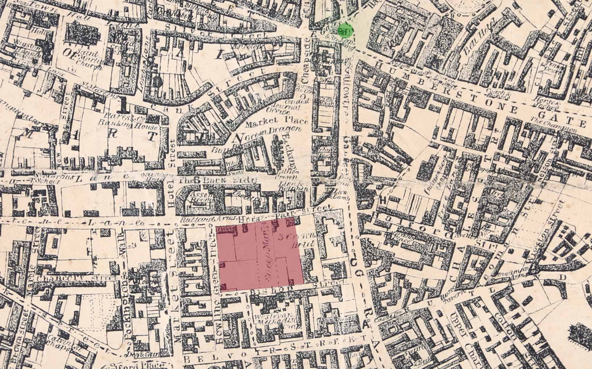 Mid-1800s map of Leicester showing the Town Hall area in pale red. The green dot is the location of the Clock Tower - 
